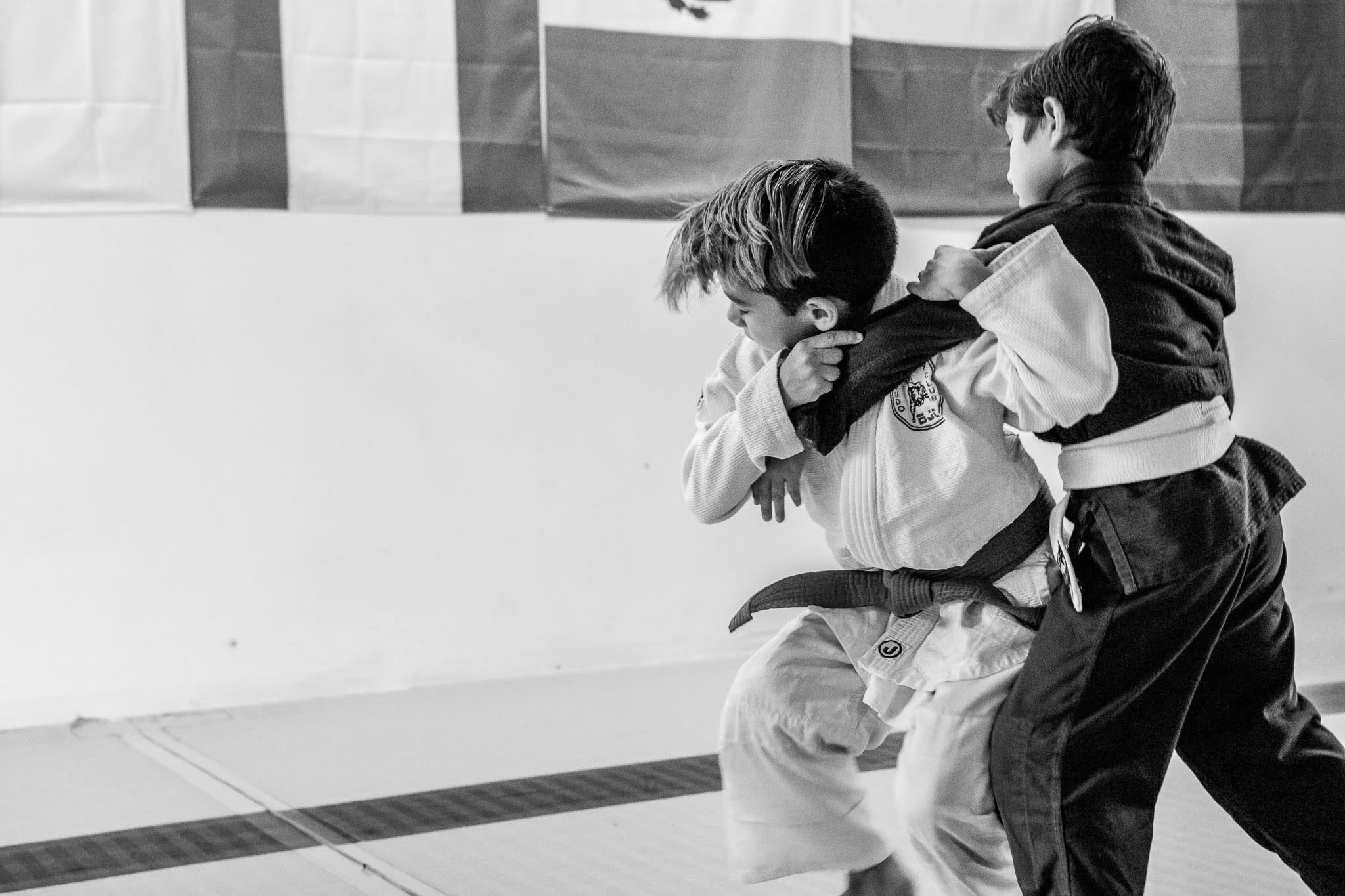Two young judo students practicing together